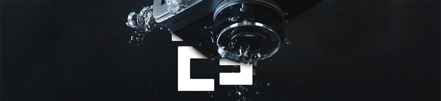 A camera captured mid-fall into a body of water splashing on its way down
