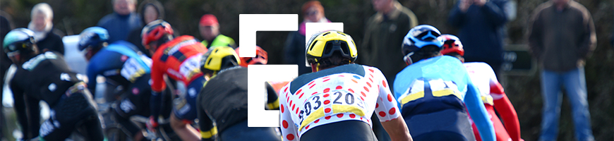 A group of cyclists racing on bikes with colourful jerseys and helmets