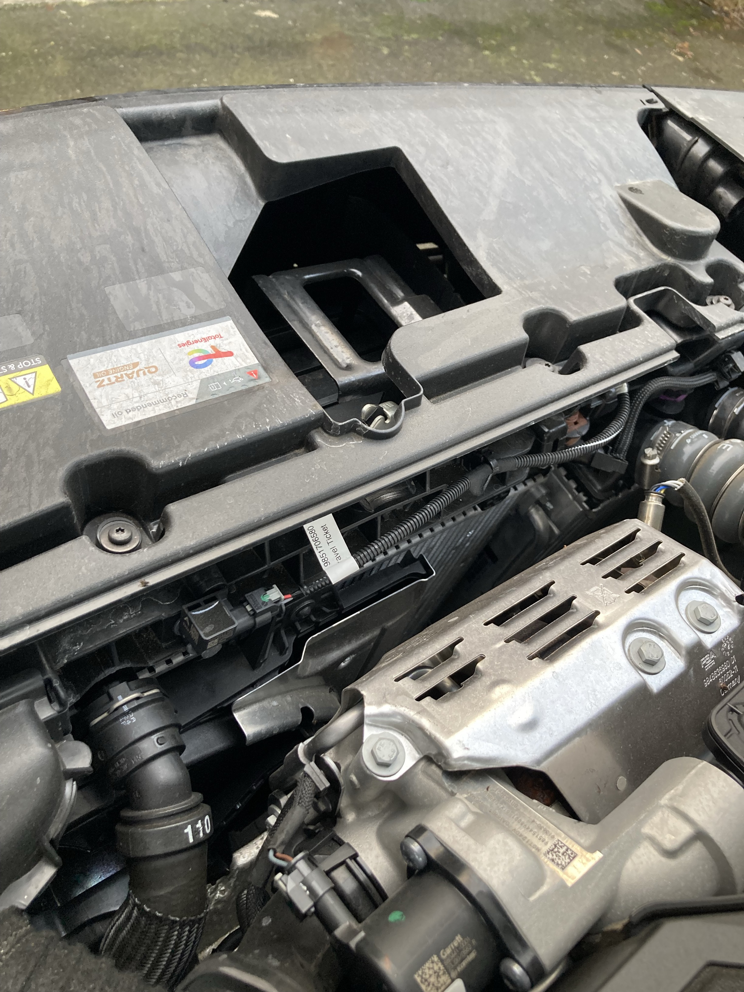 Car radiator located underneath car bonnet