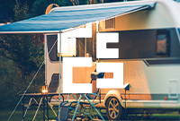 Canopy style caravan awning attached to a touring caravan