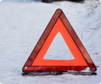 Breakdown warning triangle on snow